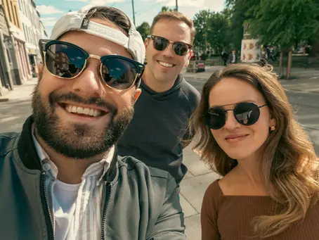 A group of friends posing for a selfie on Constitution Day in Oslo, Norway.