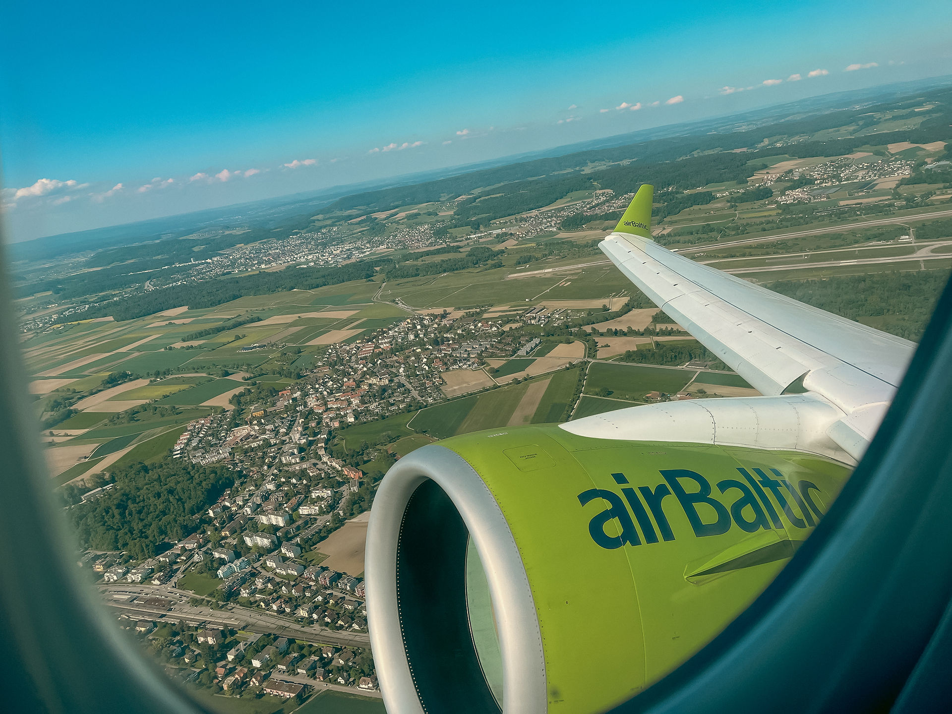 View from the airplane window of take off