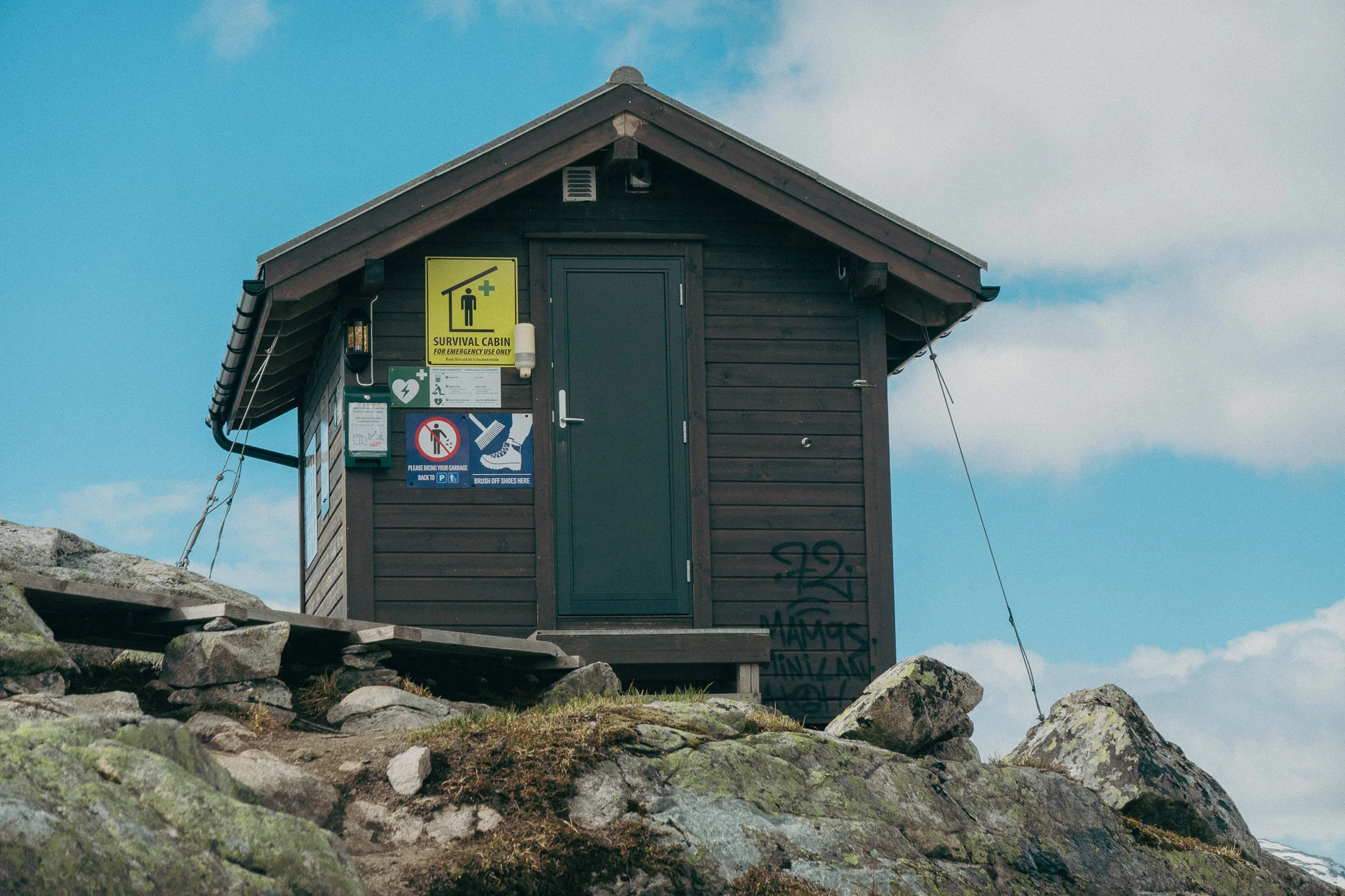 A survival cabin anchored to rocks on the Trolltunga trail in Norway