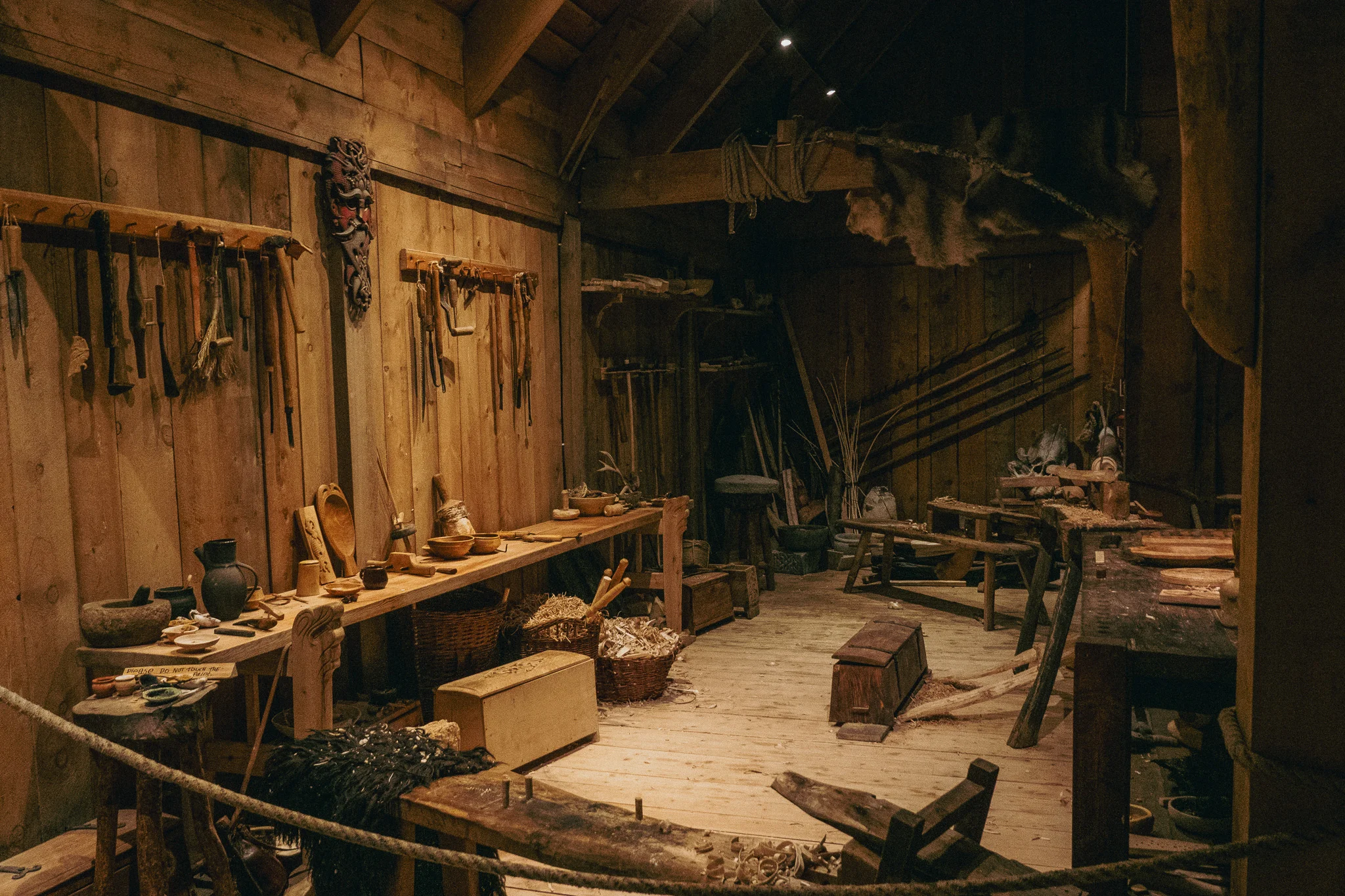 A room displaying various traditional Viking tools in the Lofotr Viking Museum
