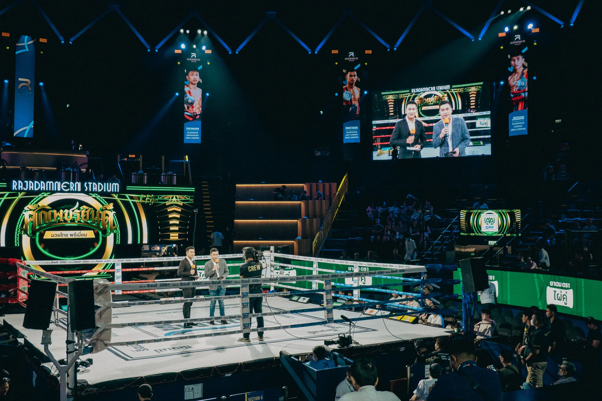 Wide shot of the interior of a Muay Thai fight