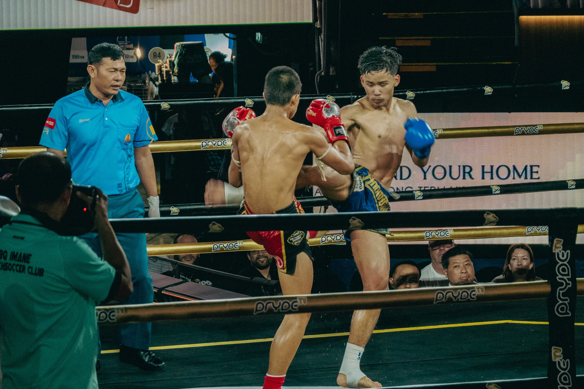 Muay Thai Fighters in combat in the ring