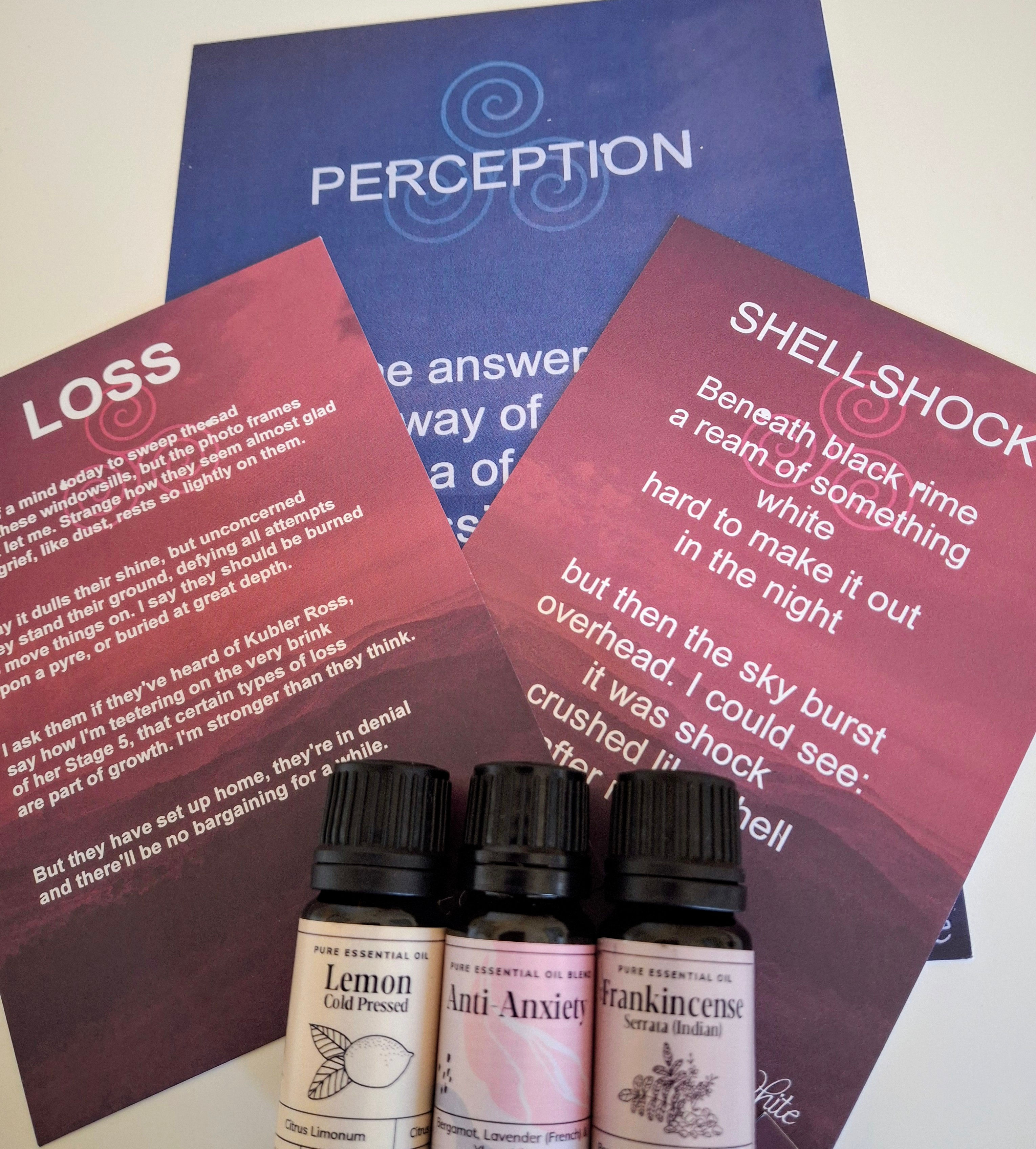 Image. Three large print cards and three essential oils.