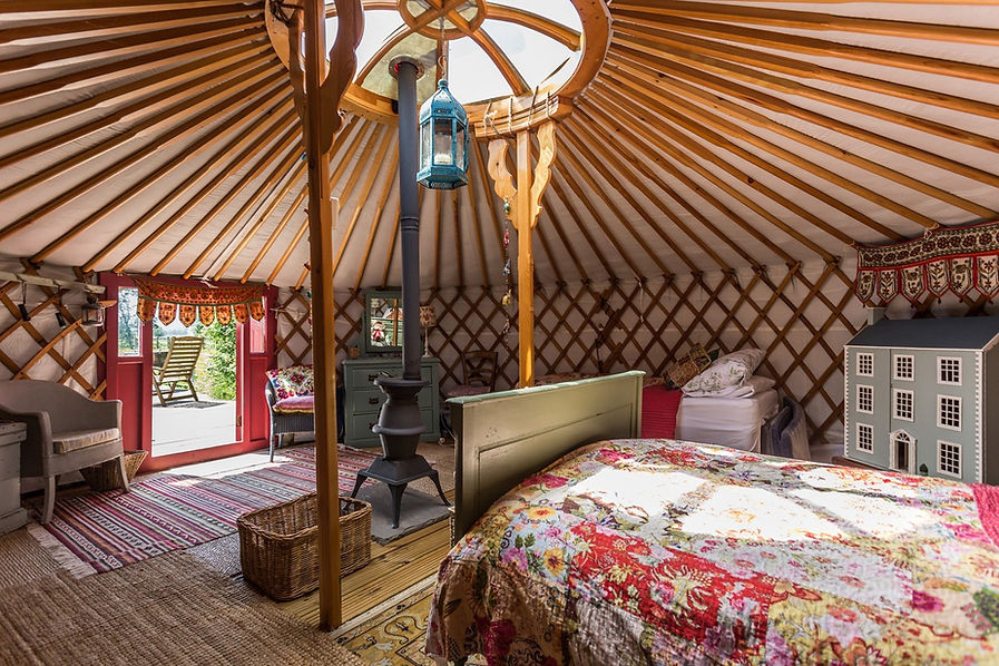 Mongolian Yurt interior decorated with traditional English furniture and decoration