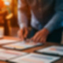 realistic-photo-with-and-orange-hue-of-documents-o-wRpyNUIjRMic7gB4_7Z2lw-tGsDj1R-RLmQdWfA