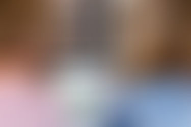 two women looking at a laptop screen