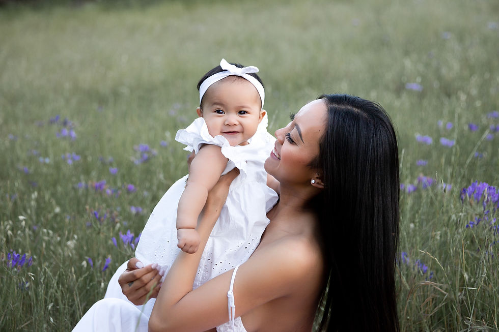 mommy and me photo session at Mount Diablo- mother and baby in grassy purple wildflower field