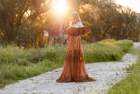 pregnant mama on Lafayette hilltop at golden hour