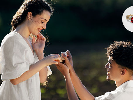 a man proposing to his girl with an engagement ring
