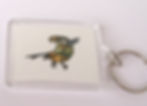 key ring with green and yellow bird image