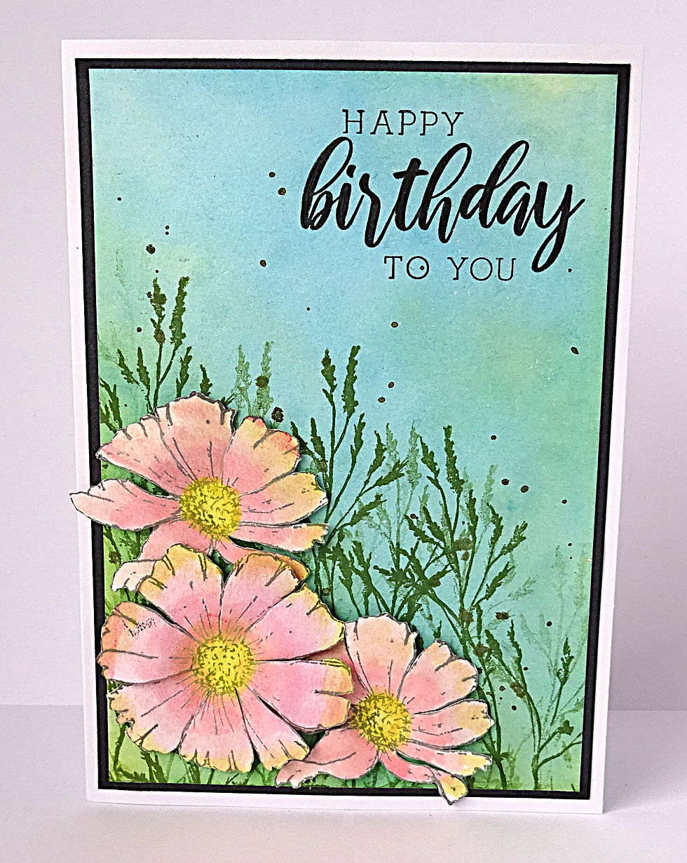 Happy birthday to you card with pink flowers and green stems on an aqua background.