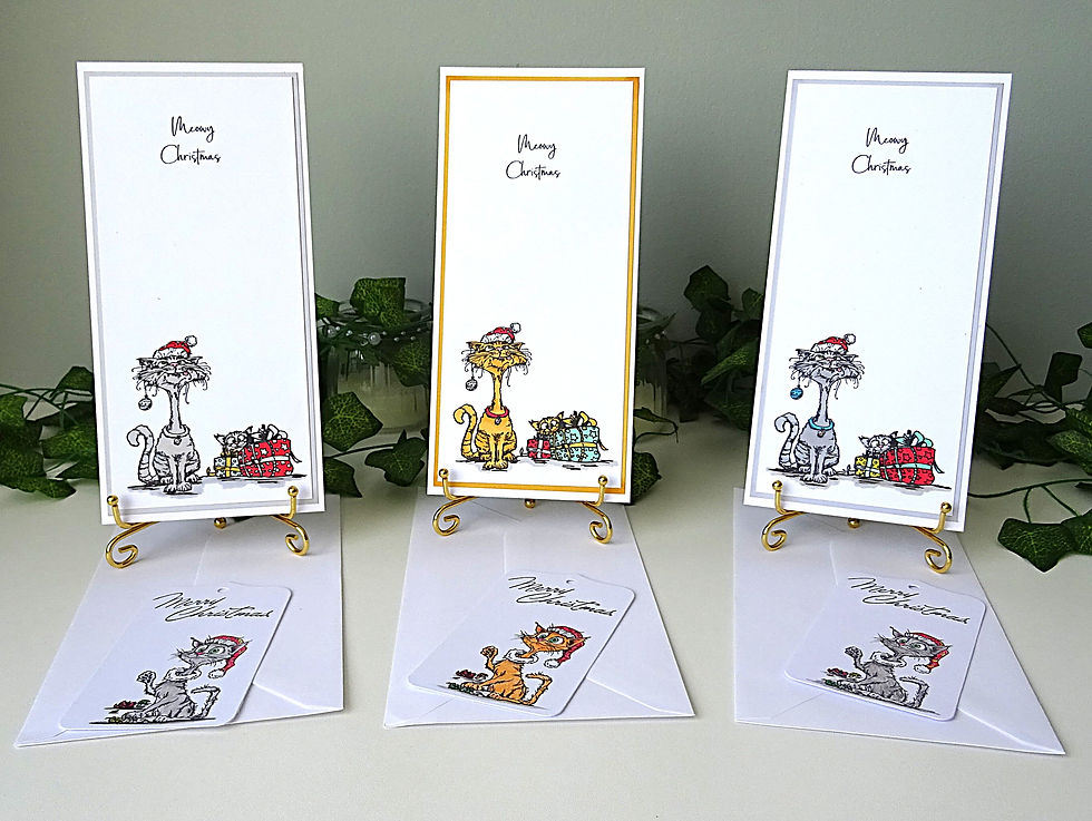 Set of three Christmas cards featuring cats among presents with a kitten hiding in the presents.