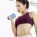 Woman lifting dumbbell