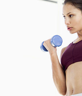 Woman lifting dumbbell