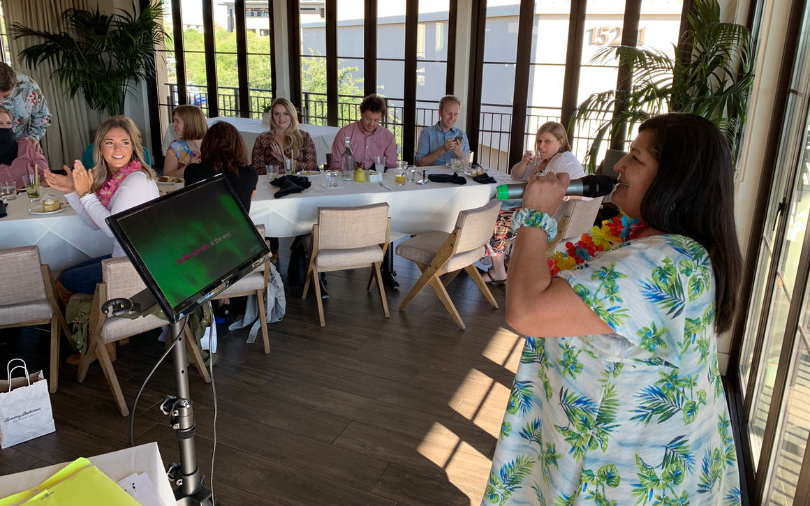 Karaoke signing at business luncheon or donner