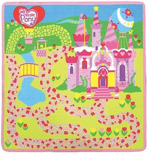 Play mat; it features a castle, paths, and hot air balloon