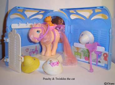 Peachy with Twinkles in Basket, in front of Pretty Parlor Playset