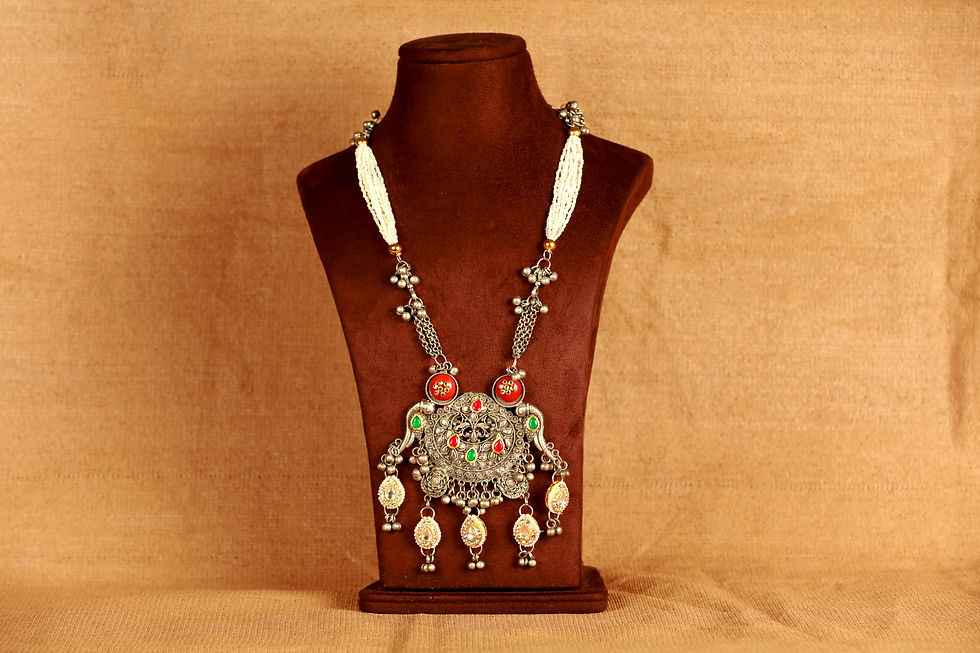 Thumbnail: Regalia jewelry set with red and green gems