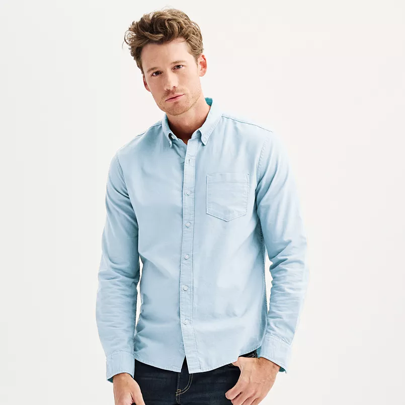 man in a light blue button down shirt