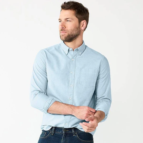 man in blue denim button down shirt