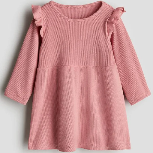 pink girls dress with ruffle shoulders