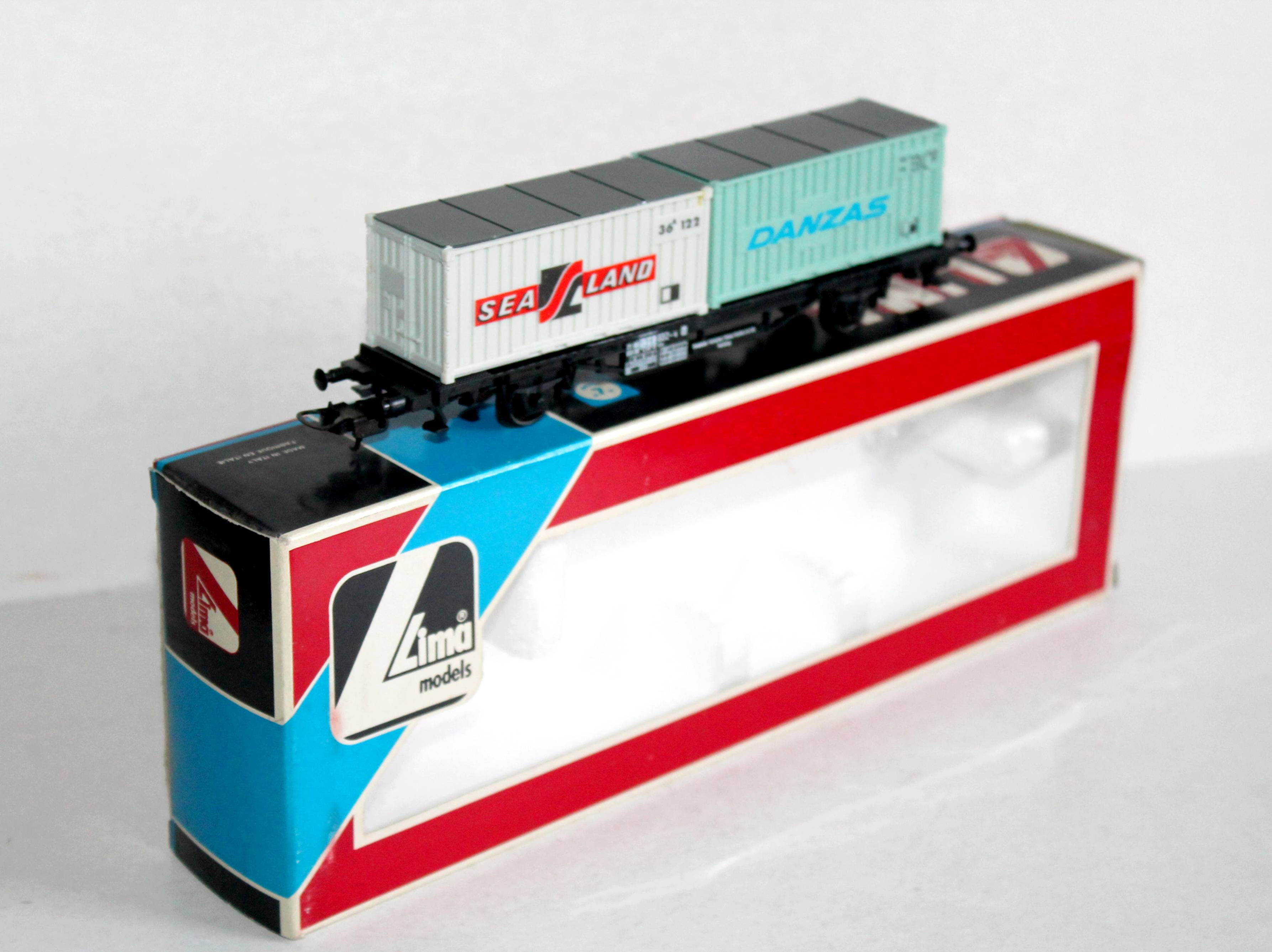 LIMA HO 302856 WAGON PLATEFORME PORTE CONTAINER + 2 CONTENEUR SEA LAND DANZAS DB