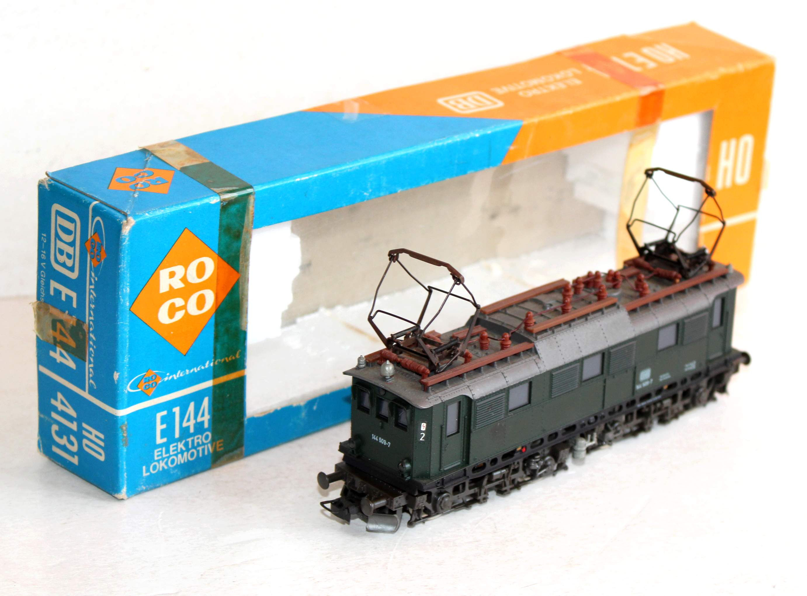 ROCO HO 4131 LOCOMOTIVE MOTRICE ELECTRIQUE DB E 144 509-7 MOTEUR + ECLAIRAGE OK