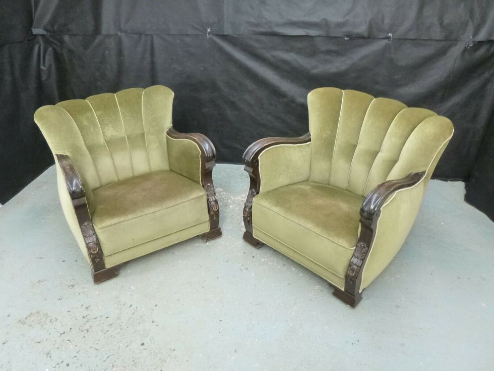 Thumbnail: A pair of Danish carved stained beech lounge chairs