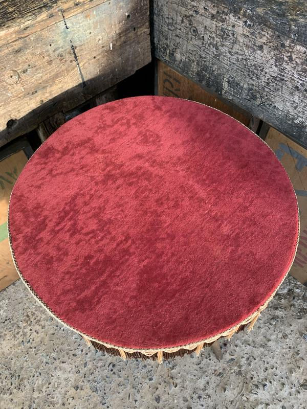 Thumbnail: A wooden bobbin gypsy table with red velvet top