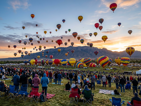 hot air balloons lifting into the air