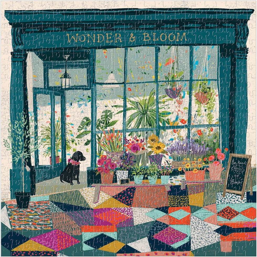 Galison “Wonder & Bloom” 500 piece puzzle showing a friendly plant shop with a black lab at the door.