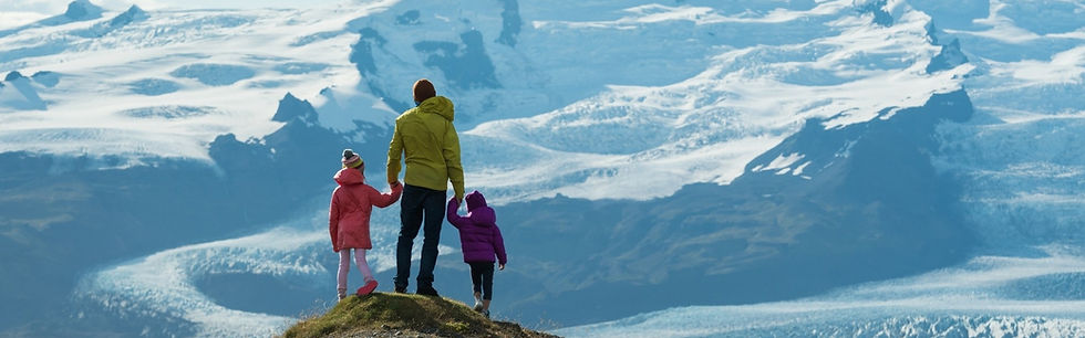 Family gazing at a glacier, The Family Travel Studio