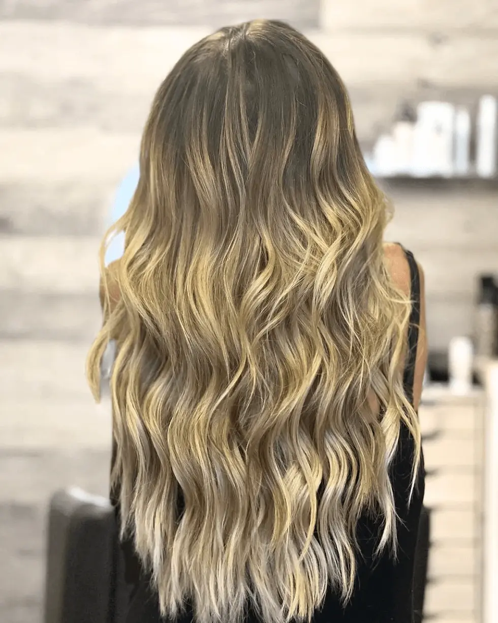 Blonde dimensional color with soft waves