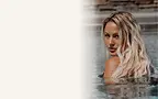 Blonde hair model in water with soft waves