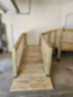 Newly built wooden access ramp in garage