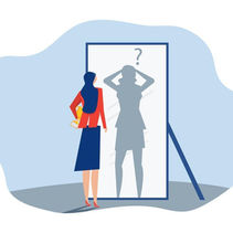 Woman looking in a mirror