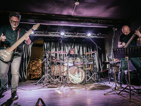 The Immovable Architects of Sound: Stick Men Perform Live at The Garrison