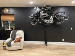 A Harley Davidson motorcycle displayed on a wall.