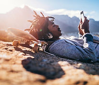 Man outdoors scheduling energy healing consultation — remote support for clearing questions, session guidance, and next steps.