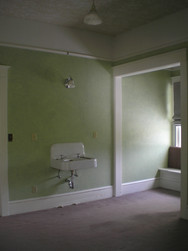 Each of the four upstairs bedrooms had these sinks hanging on the walls. They looked kinda sad.