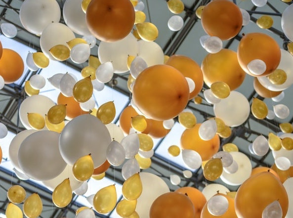 hundreds of floating colorful balloons