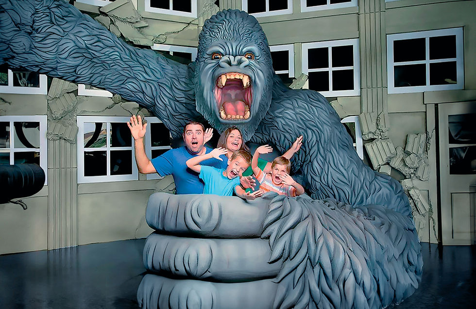 A dramatic 3D sculpture of a gorilla gripping a skyscraper, with a plane in hand, creating an eye-catching and adventurous entrance to the Hollywood Wax Museum.
