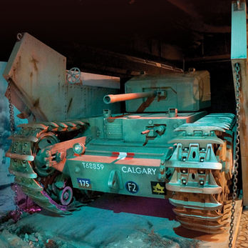 World War II Tank Exhibit – A replica of a World War II tank on display, complete with realistic weathering and historical detail, showcasing its role in military history.
