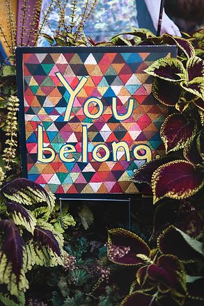 Telling a person that they belong