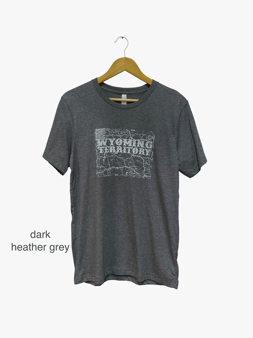 Thumbnail: dark grey t-shirt with print in white: road map of wyoming and text "Wyoming Territory" over the map