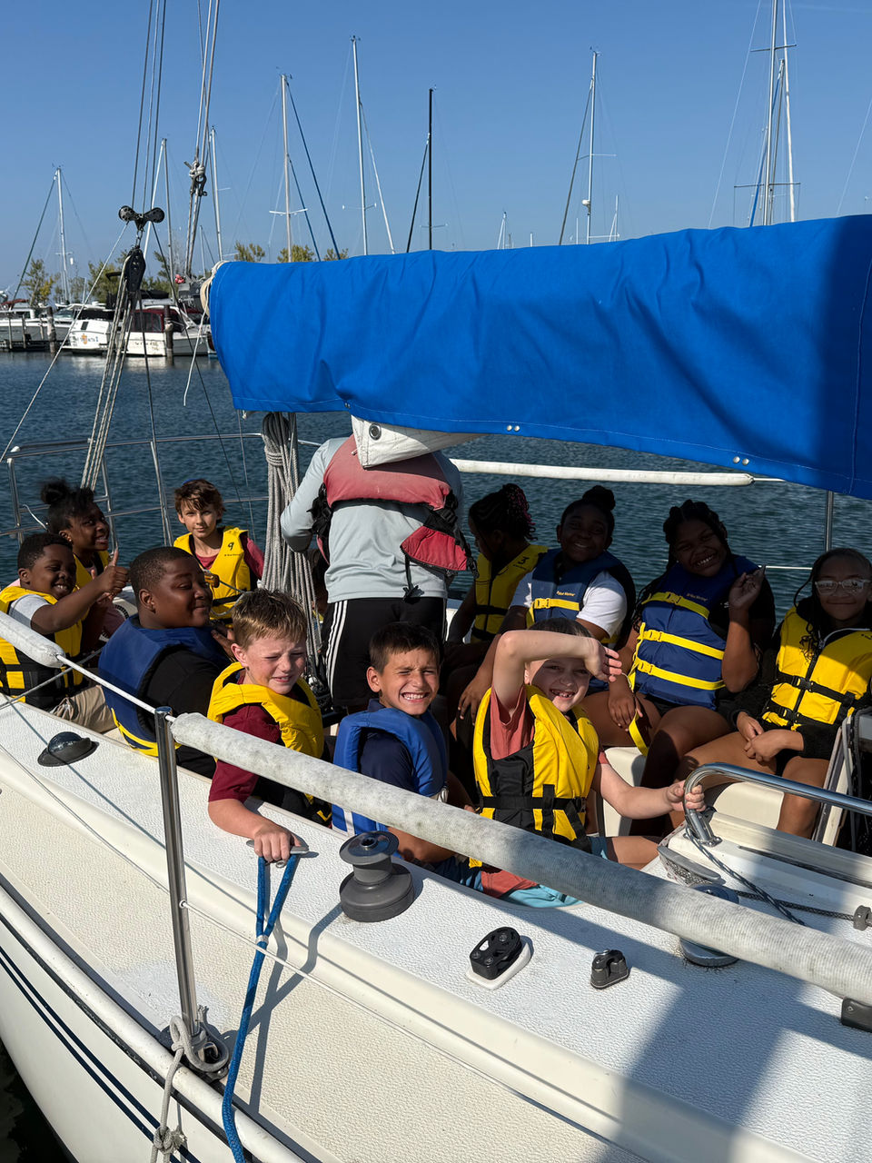 Sailing academy students on a sailboat