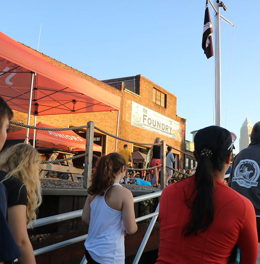 Kids carrying row boat