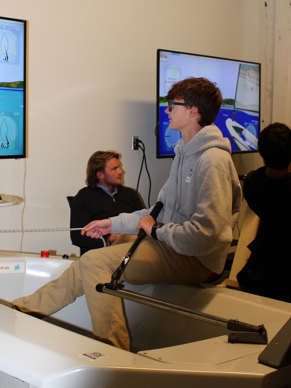 Person training on a sailing simulator