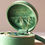Thumbnail: Sun and Moon Embroidered Round Jewellery Case in Green