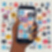 Hand holding phone displaying social media apps